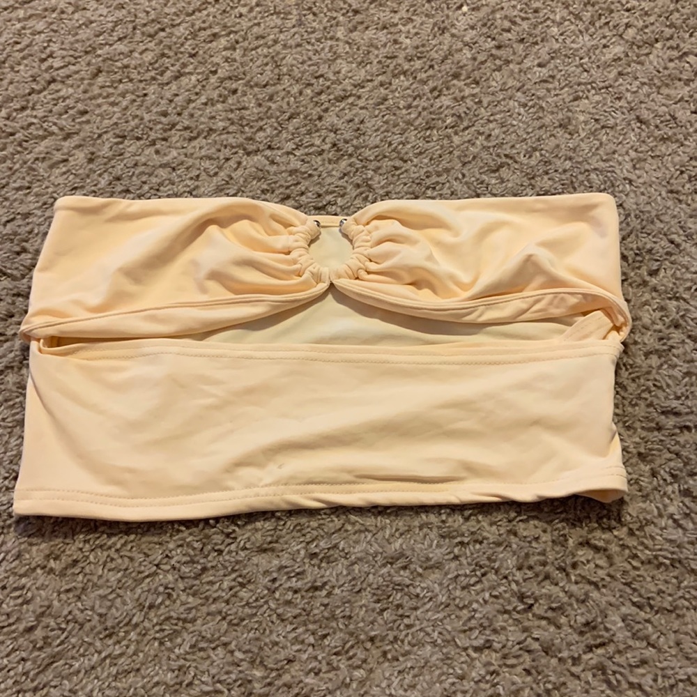 crop top with ring in the center and belly cut out